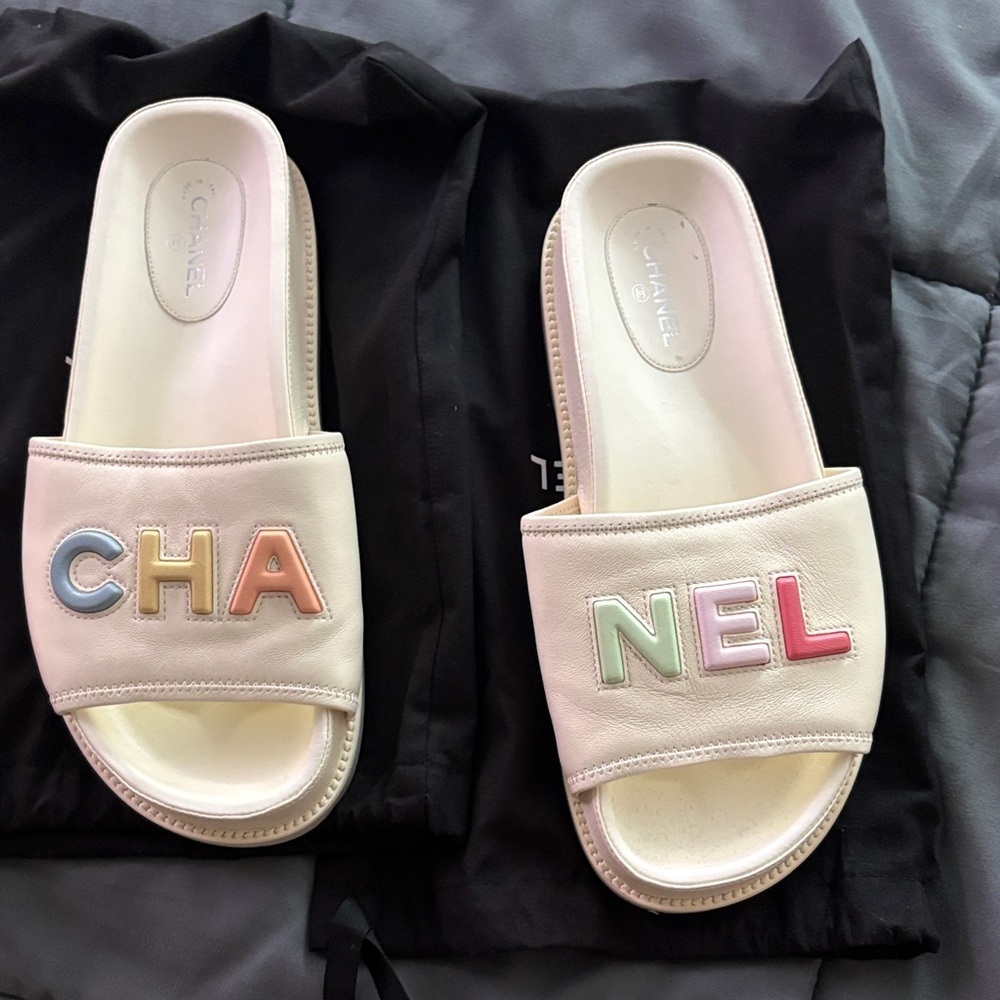 CHANEL White Leather Slide Sandals with Pastel Lettering
